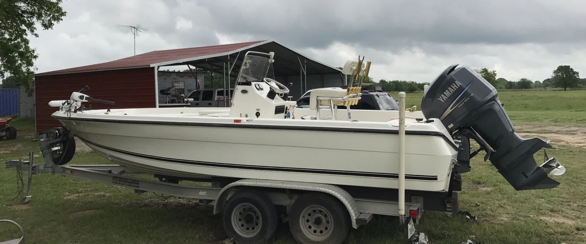 About moestackleshop.com — Mike Oser’s fishing boat with a Yamaha outboard motor.